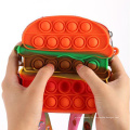 Personnalisez le sillicone à serrer en silicone fidget toys rainbow dessin animé push pop bulle jouet sac pour les enfants